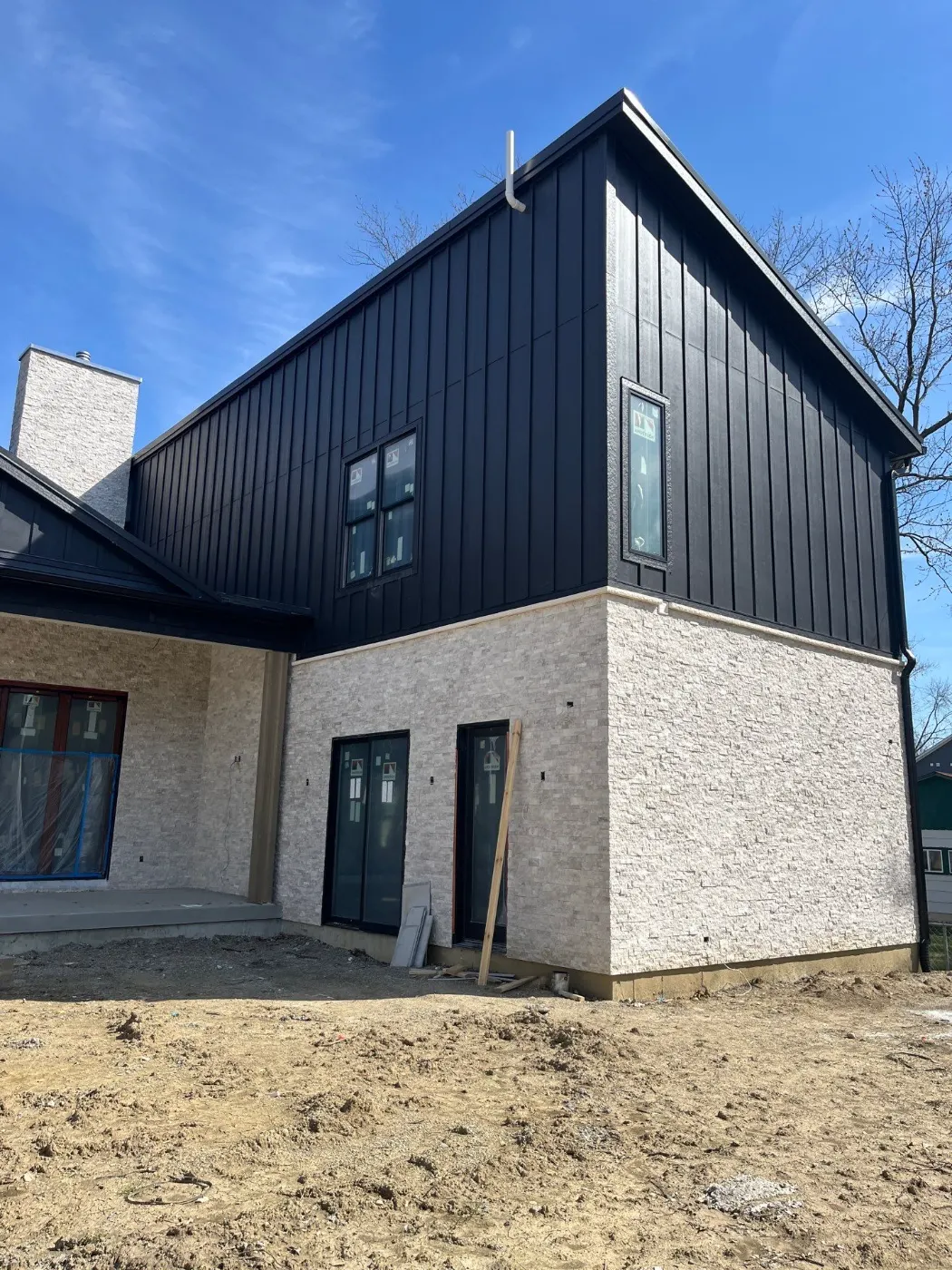 Siding installation documented in Raintree Village
